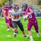 Burlington Husky James McNiven stops the Midwest runner at the game in Midwest on Friday. Stephanie Tolman