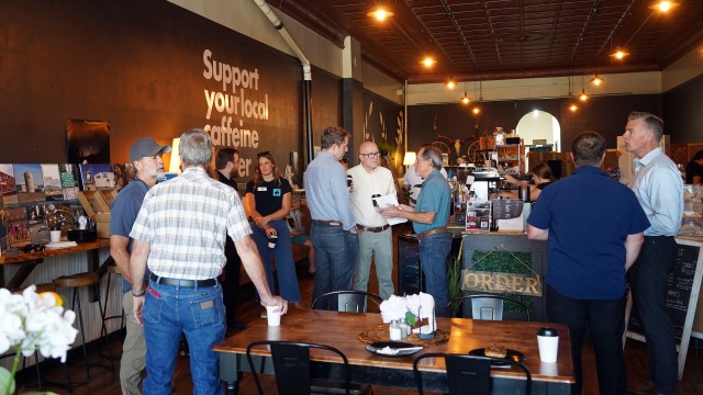 Members of the Wyoming Business Council talk with community members last Thursday morning in the Wyld Sage Coffeehouse in Greybull. Lisa Kunkel