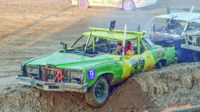 Cooper Zieroff finds himself stuck on the dirt barrier during the Demolition Derby Saturday evening. Dakoby Bentley