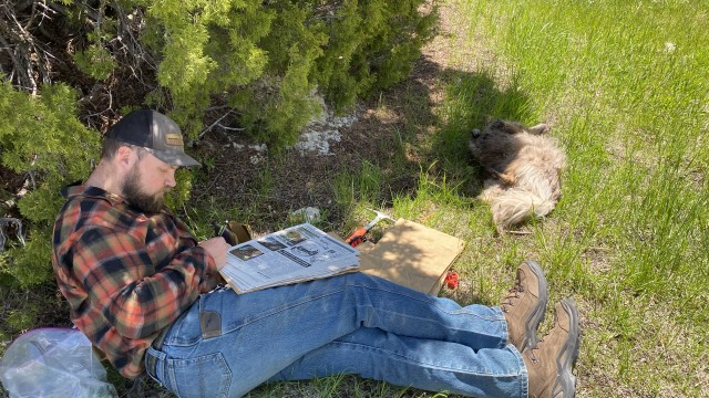 Dan Coles takes a much-deserved break near the entrance to the Shell Falls area, where he spent most of one summer. John Bernheisel